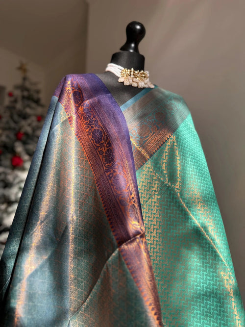 Authentic green saree with navy blue border  copper zari and sheen. Traditional silk saree beautiful colour and design. Designer saree