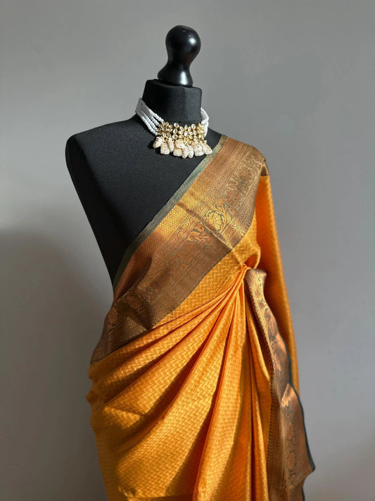 Authentic mustard saree with dark green border  copper zari  sheen. Traditional silk saree beautiful colour and design. Designer saree - LaiLai Sarees