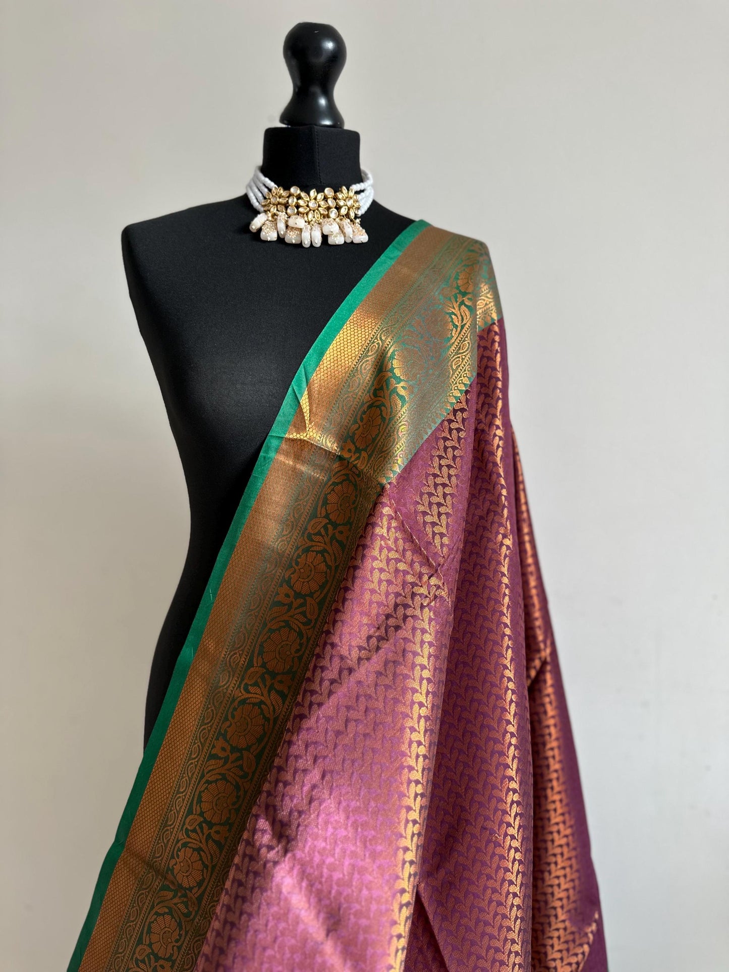 Wine colour saree with green border with copper zari and sheen. Traditional silk saree beautiful colour and design. Designer saree