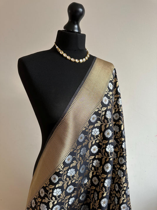 Pure black jaal geogrette designer sare with rich pallu and weaved jaal design and rich silver and gold look with contrast designer blouse