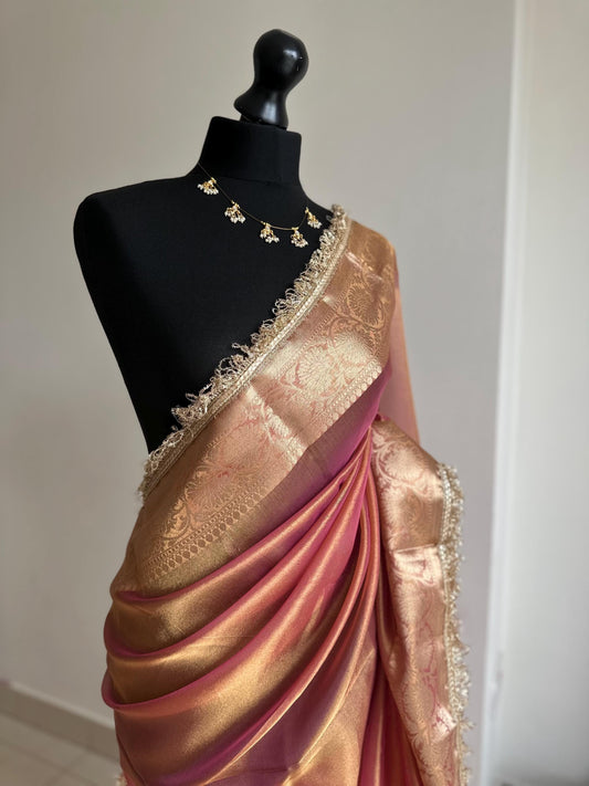 Pink and gold dual toned plain shimmer soft tissue saree with border and unstitched blouse. Elegant wedding guest saree unique saree look