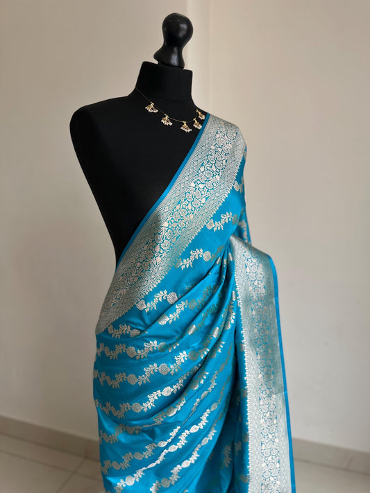 Banarasi silk peacock blue wedding saree with silver zari. Exquisite blue semi silk saree with plain contrast blouse. Stylish elegant saree