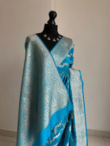 Banarasi silk peacock blue wedding saree with silver zari. Exquisite blue semi silk saree with plain contrast blouse. Stylish elegant saree LaiLai Sarees