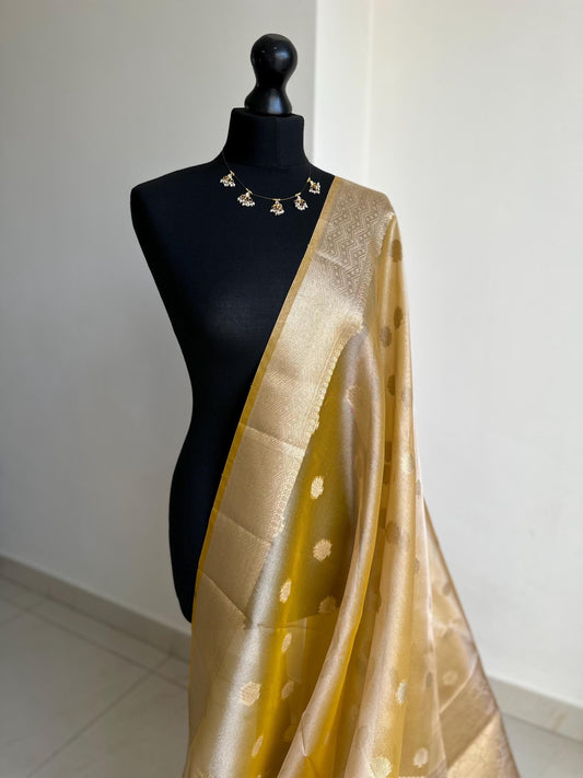 Statement handmade yellow gold soft tissue saree with unstitched blouse. Golden yellow wedding saree. Unique saree look for events