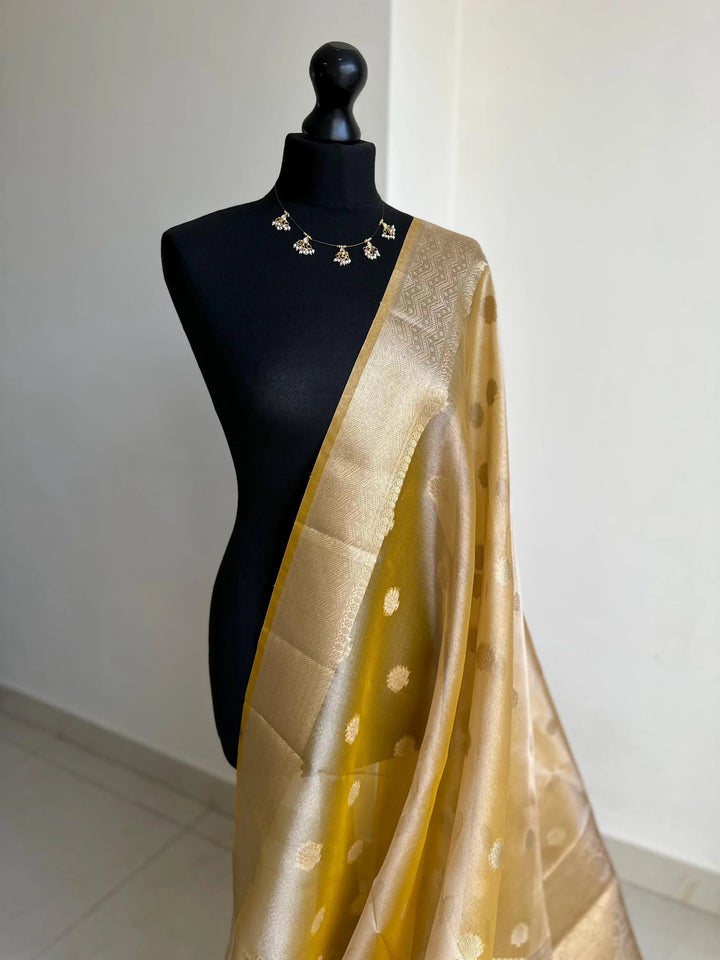Statement handmade yellow gold soft tissue saree with unstitched blouse. Golden yellow wedding saree. Unique saree look for events LaiLai Sarees