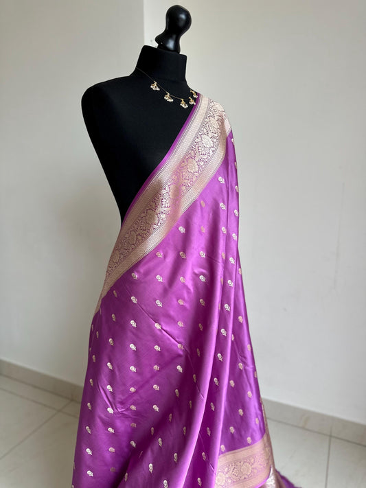 Banarasi silk lavender wedding saree with gold zari. Gold and lavender silk traditional saree with plain contrast blouse with border
