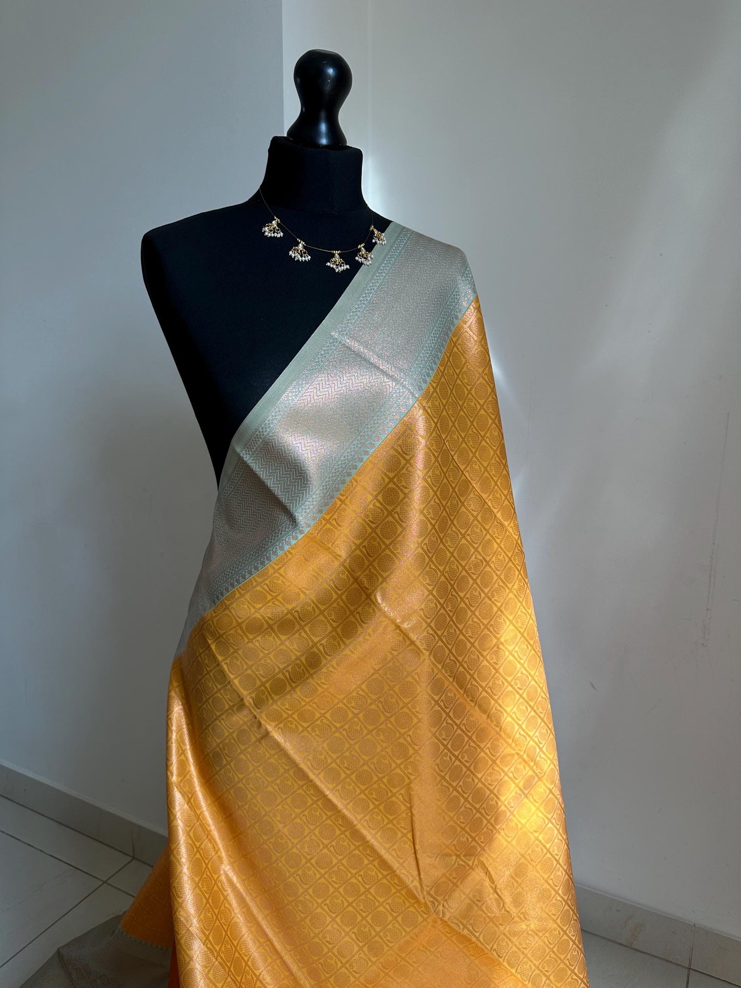Pastel blue and mustard Semi Silk Saree: Gold Zari Border, Unstitched Blouse