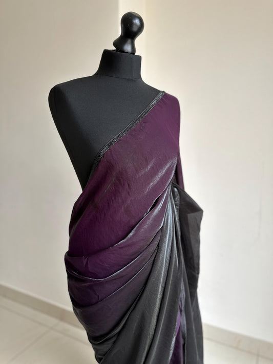 Ready-pleated black and purple shaded saree with cutdana stonework border, comes with belt. Prestitched saree for parties