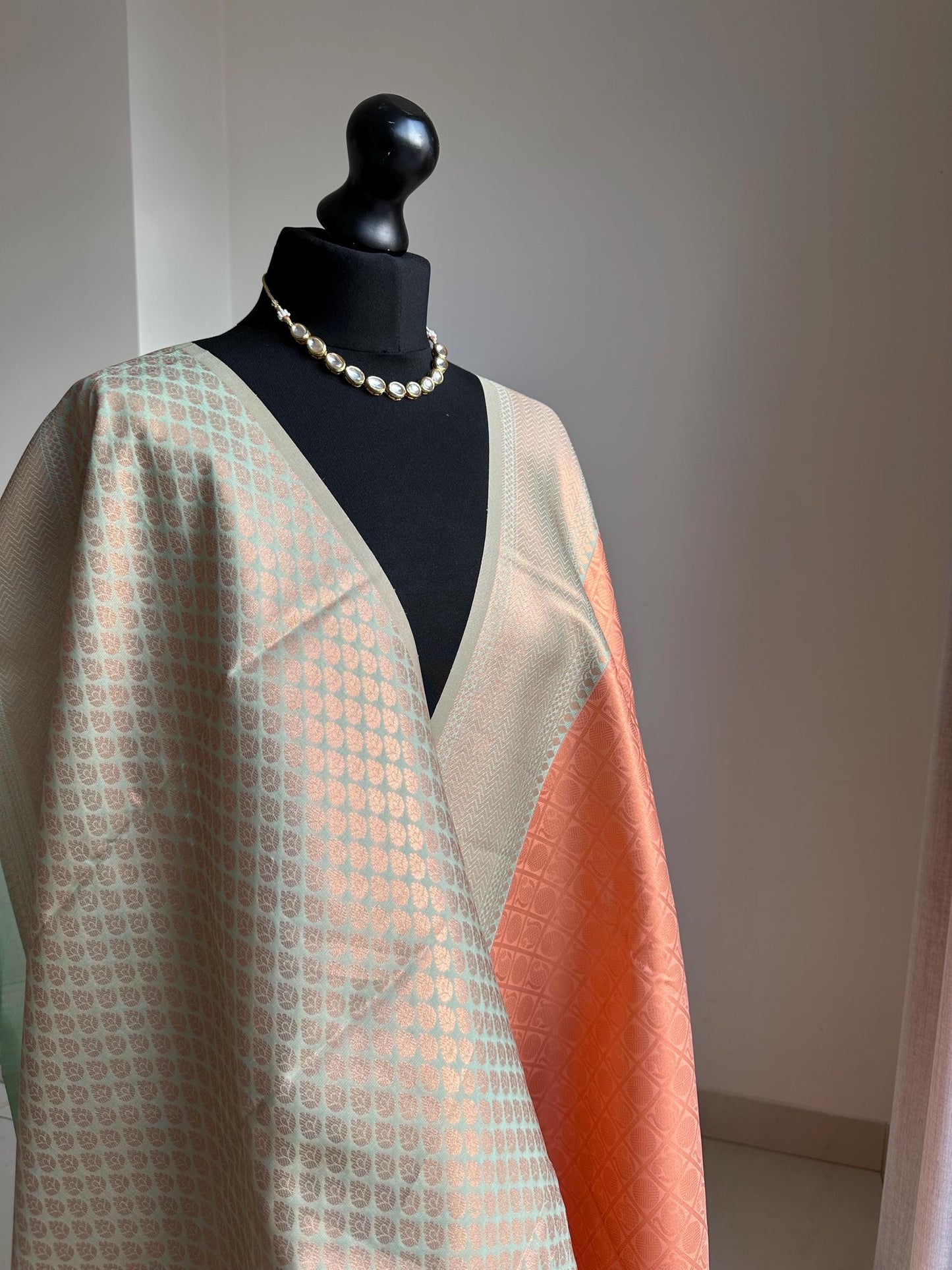 Peach and mint green Semi Silk Saree: Gold Zari Border, Unstitched Blouse